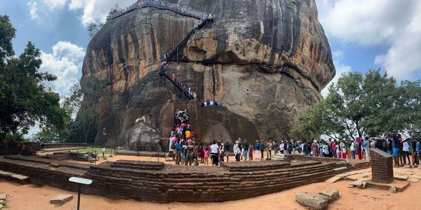 From Kandy: Sigiriya, Dambulla and Minneriya Private Tour - Dambulla Cave Temple, where art and worship continue