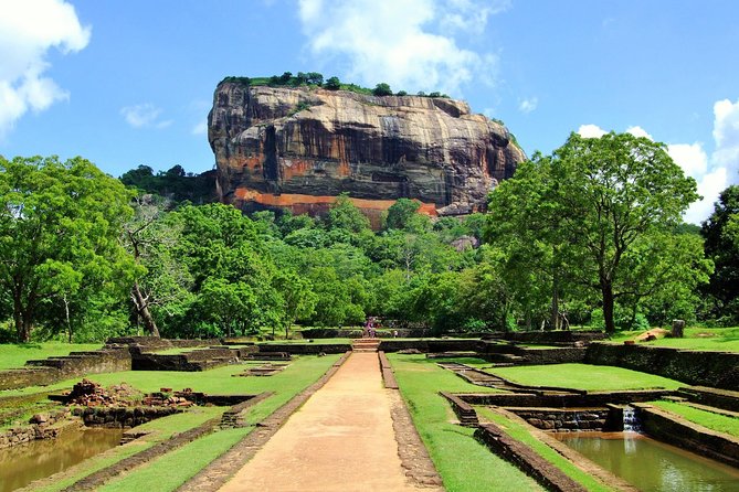 Full-Day Private Sigiriya and Dambulla from Kandy - Climbing Sigiriya’s ancient rock fortress