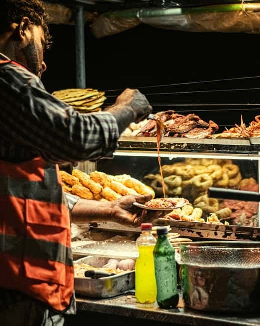 Kandy: Authentic Food Walk with a Local - Walking through Kandy between bites