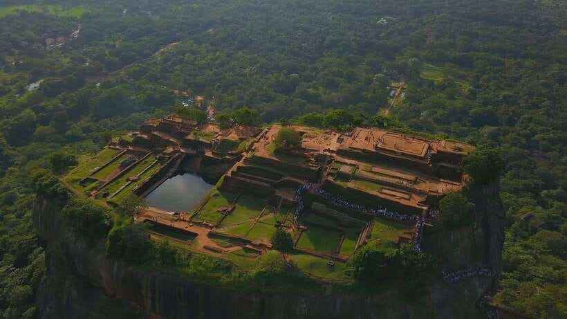 Kandy: Sigiriya Fortress & Cave Temple Full Day Private Tour - Climbing the golden rock at Sigiriya