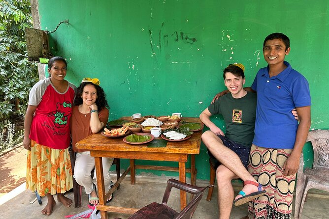 Organic cooking class sigiriya (kumara & family) - Working together over the outdoor fire