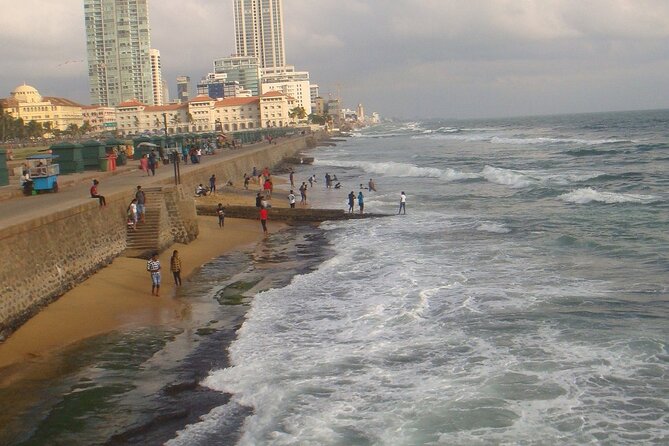 Ride and Explore Colombo and Food By Tuk Tuk Tour All Inclusive - Lotus Tower, the Old Parliament, and the coast