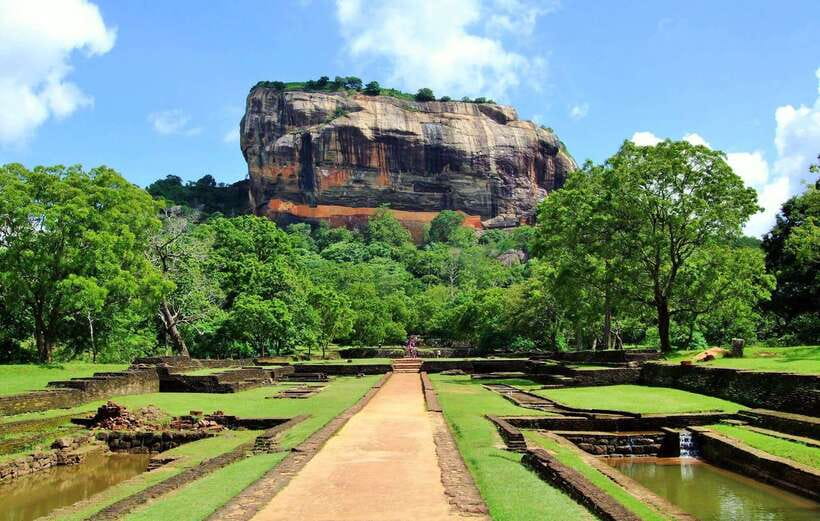 Sigiriya Rock Hike & Minneriya Elephant Safari – Day Tour - Climbing through Sigiriya’s water gardens