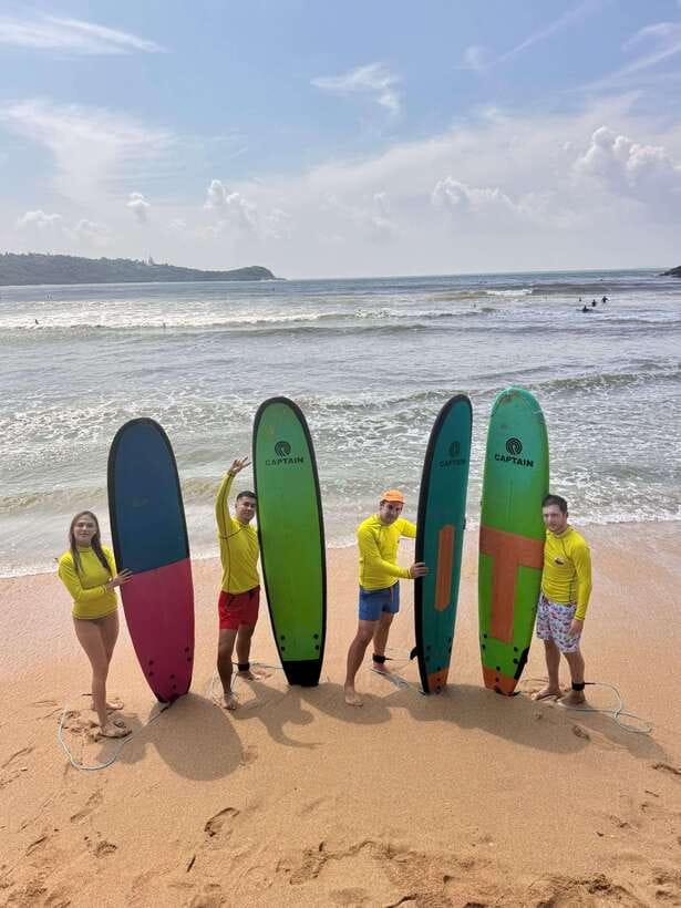 Surf School in Unawatuna, Galle - Working With the Instructor in the Waves
